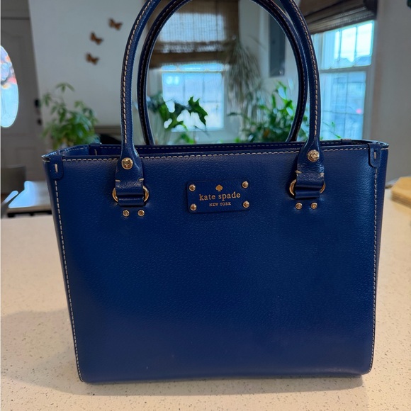 kate spade cobalt blue Wellesley Quinn tote bag featuring gold-toned hardware. - Picture 5 of 14